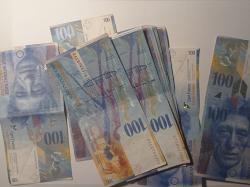 Обменять старые швейцарские франки в . ..